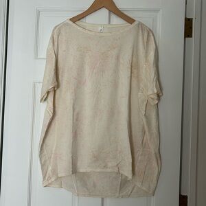 Lululemon top, size 12.  Great condition.  White with pink, tan design.